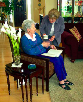 Caregiver enjoying coffee with client